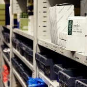 Photo of a shelf with parts on it.